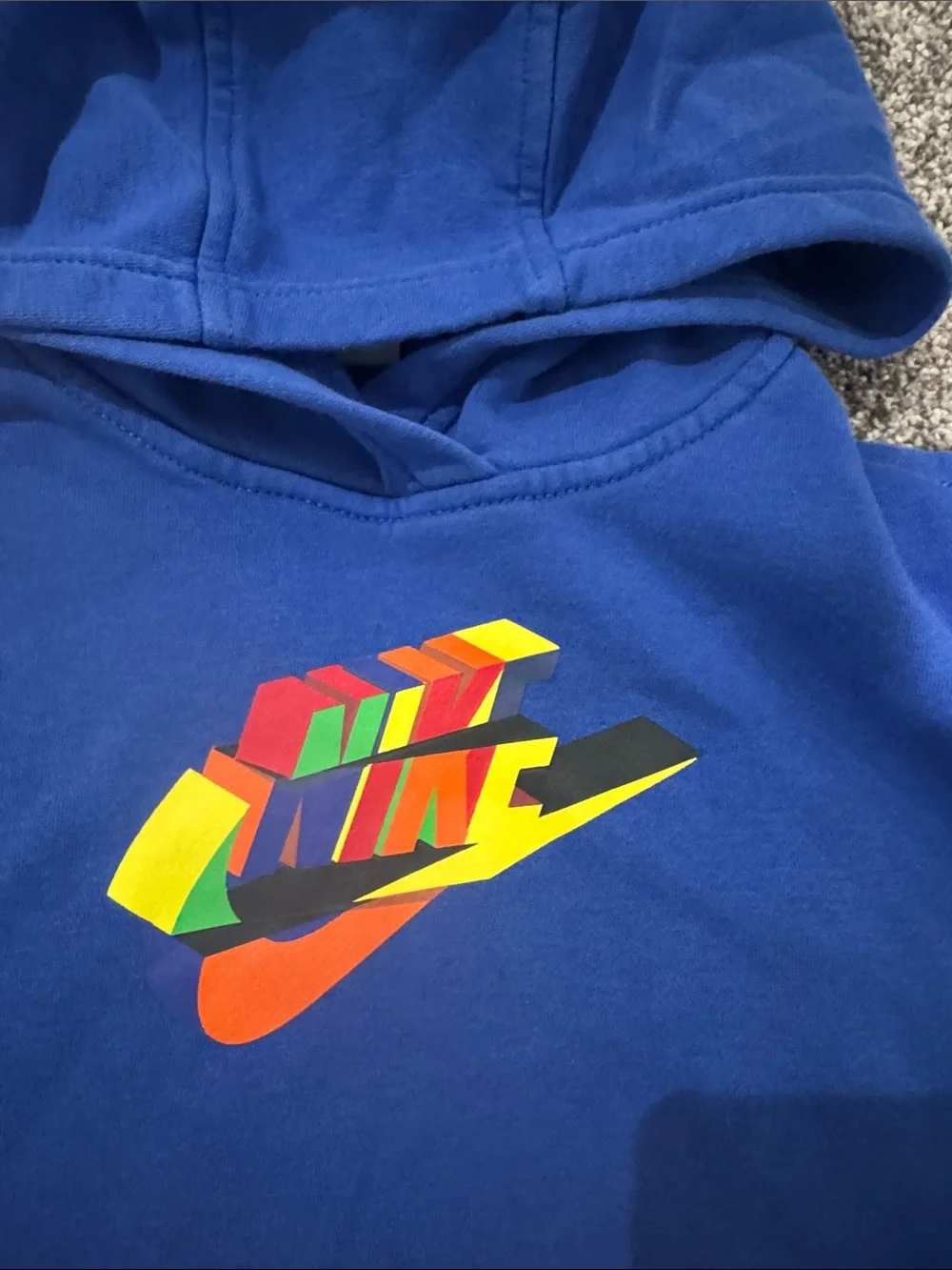 Nike Blue Hoodie with Red Pocket and Multicolor Chest Logo